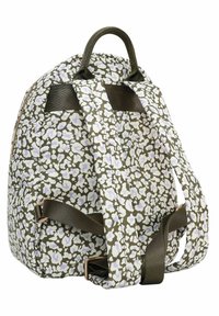 Zaino trapuntato in verde oliva con motivo floreale bianco e lavanda, dotato di spallacci imbottiti regolabili e manico superiore per il trasporto.