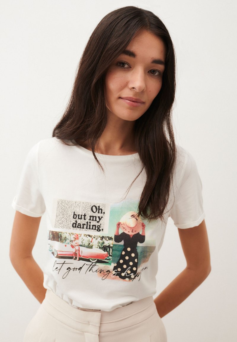 White cotton t-shirt featuring a graphic print with a collage of images, text, and a polka dot dress illustration, round neckline and short sleeves.