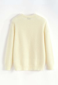 Pull tricoté de couleur jaune clair avec un motif texturé, encolure ronde, poignets et ourlet côtelés. Comprend des manches longues et un design décontracté.