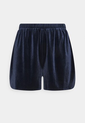 Shorts en velours bleu marine avec une taille élastique, offrant une coupe décontractée et une texture lisse. Sans poches ni embellissements supplémentaires.