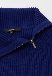 Navy knit sweater with a high collar, featuring a zip closure and ribbed texture. Label reads 'someday.' Size 36.