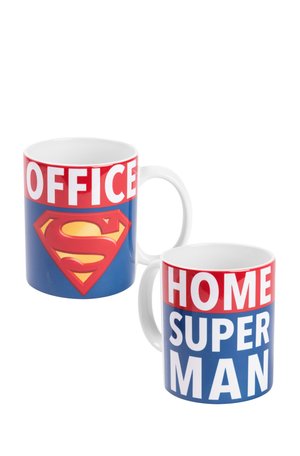 Two ceramic mugs with white handles; one says "OFFICE" above a Superman logo, the other says "HOME SUPERMAN" in bold white and red letters.