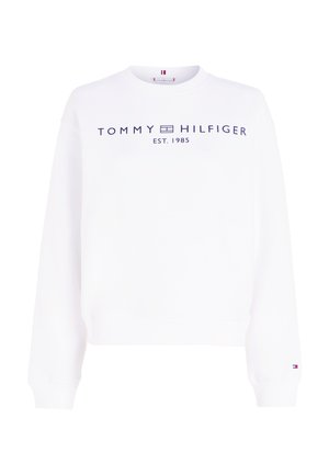 Hvit hettegenser laget av bomull, med rund hals, lange ermer, og marineblå logo tekst "TOMMY HILFIGER EST. 1985" på forsiden.