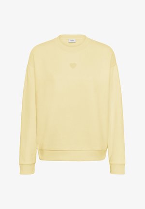 Helekollane ümara kaelusega pusa pika varrukaga, soonikkoes mansettide ja äärega ning väikese reljeefse südamega rinnal keskpunktis.