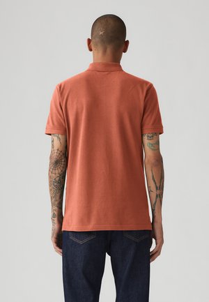 Polo - etruscan red