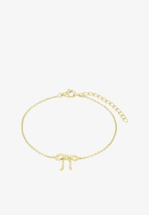 Pulsera de cadena de oro con un colgante en forma de lazo. La cadena está compuesta por pequeños eslabones, con un cierre de langosta y una cadena de extensión ajustable.