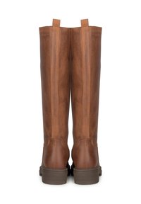 Bottes en cuir marron montantes avec une texture lisse, un dos renforcé et des languettes de tirage en haut. Elles sont dotées d'une semelle en caoutchouc marron robuste.