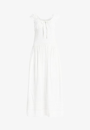 Robe maxi blanche avec un corsage smocké, des manches courtes légèrement froncées et des liens au niveau du décolleté. Présente des accents texturés horizontaux au niveau de l'ourlet.