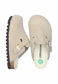 Beige fleece clogs with a textured surface, adjustable strap, and gold hardware. Cork and rubber sole with scalloped edges.