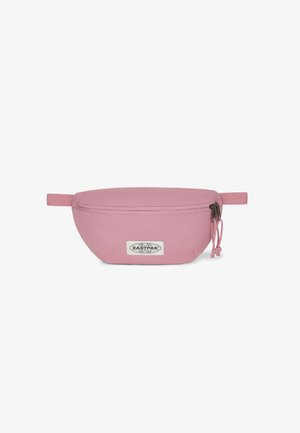 Pink pouch bag made of durable fabric, featuring a zip closure, a small front pocket, and a logo label. Round shape with side handles.