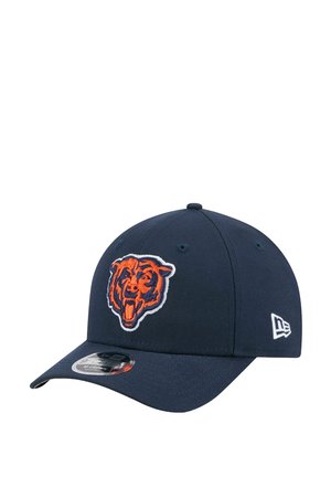 Navy baseball cap made of fabric with an orange Chicago Bears bear logo embroidered on the front. Features a curved brim and adjustable back.