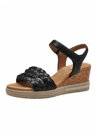 Sandali wedge neri con doppie cinghie in pelle intrecciata, suola intermedia in sughero, soletta marrone chiaro e suola in gomma testurizzata. Cinghia regolabile alla caviglia.