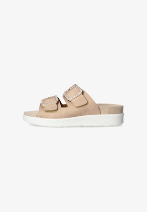 Sandalo beige modello slide con due cinturini regolabili con fibbie decorate con strass e suola platform bianca.