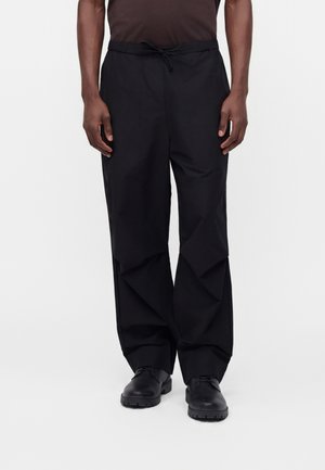 Rains, PANTS WIDE UNISEX - Pantalon classique - black