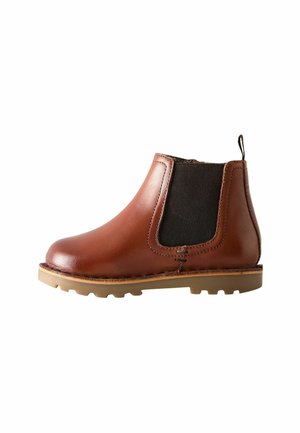 Braune Leder-Stiefelette mit elastischen Seiteneinsätzen, runder Zehenpartie und Gummisohle. Mit einem Ziehhilfen an der Ferse für einfaches An- und Ausziehen.