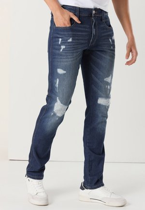 MITTLERE - Straight leg jeans - blau
