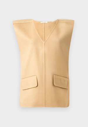 Beige sleeveless vest with a V-neck, featuring two front patch pockets and a soft texture, designed with minimal seams for a modern look.