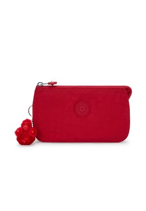 Red rectangular zippered pouch with round logo patch and small plush monkey keychain attached on the side.