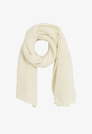 Bufanda de punto de color crema suave, dispuesta de manera holgada, mostrando textura y grosor sobre un fondo blanco.