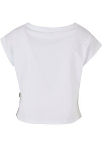 T-shirt bianco in cotone con vestibilità ampia, maniche a cappuccio corte, scollo rotondo e leggera curva dell'orlo in vita.