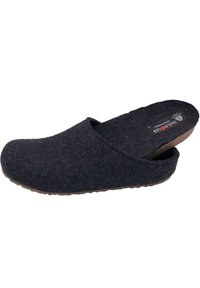 Black felt clogs with an open back, flat cork footbed, textured surface, and rubber sole. Label visible on the insole.
