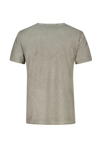 Camiseta de algodón gris con cuello redondo y mangas cortas. La tela parece suave con una ligera textura jaspeada. Vista trasera.