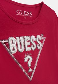 Guess LOGO - Ilgarankovis viršutinės dalies drabužis - rot