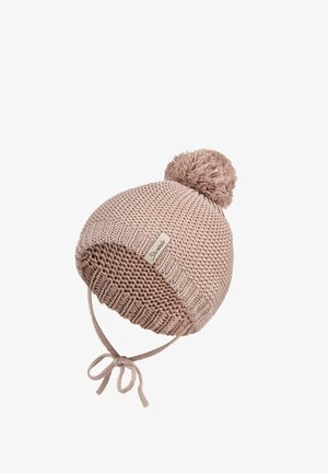 Pink knitted baby hat with pom-pom on top, earflaps, and tied strings beneath the chin.