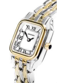 Montre rectangulaire Sekonda avec un bracelet en acier inoxydable or et argent, un cadran texturé blanc, des chiffres romains noirs et une couronne décorative.