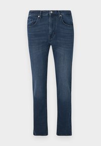 Jeans de mezclilla ajustados en azul oscuro con bolsillos frontales y para monedas, cierre de botón y un ligero desvanecimiento en los muslos.
