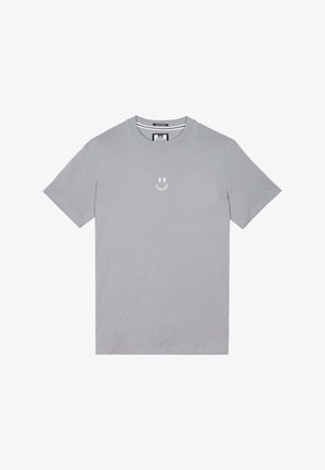 Grijs katoenen t-shirt met korte mouwen en een ronde halslijn. Bevat een kleine witte smiley gezichtsillustratie op de borst.