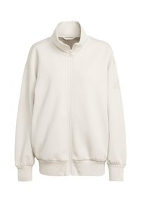 Krémová mikina na zips s vysokým golierom, spustenými ramenami, rebrovanými manžetami a spodným lemom, vyrobená z hladkého materiálu a s jemným logom na rukáve.