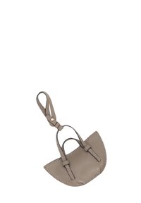 Small grey leather handbag with a curved, structured design. Features two short handles and a loop for attachment. Textured finish and stitching details.