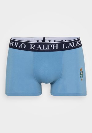 Svijetloplave uske bokserice s tamnoplavim elastičnim pojasom na kojem piše "POLO RALPH LAUREN" i izvezenim medvjedom u zelenoj odjeći.