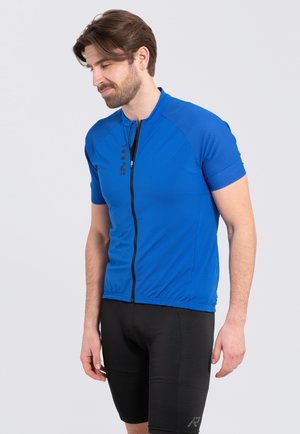 Blue cycling jersey with short sleeves, textured fabric, front zipper, and black accents. Paired with black cycling shorts.