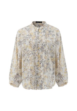 Blumenbluse mit gelben und grauen Mustern auf einem hellen Hintergrund. Lange Ärmel, gefaltete Vorderseite und Knopfverschluss. Weicher Stoff.