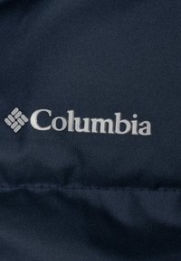 Columbia SNUGGLY BUNNY BUNTING - Ziemas kombinezons - dark blue