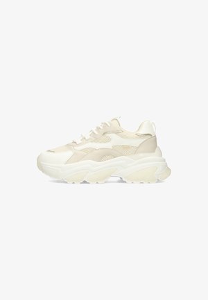 Chunky sneakers featuring a mesh upper in light beige, white accents, textured panels, and a thick, cushioned sole for support.