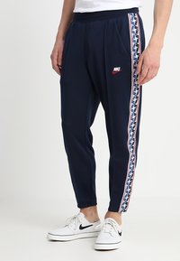 Nike Sportswear Träningsbyxor - dark blue