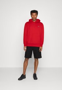 Lacoste Jersey con capucha - red