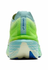 Roheline ja helesinine sportlik king, millel on võrkkangas ülaserv, tugevdustatud konts ja tekstureeritud tallad. Omab sinist logo kontsul ja lainelist mustrit tallal.