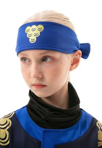 Blue fabric headband with gold circular patterns, tied at the back. Worn with a black neck piece, accented by a blue and gold outfit.