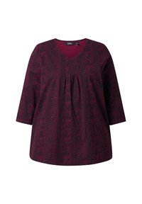 Tunique bordeaux à motif avec des manches trois-quarts, décolleté en V et détail plissé à l'avant. Fabriquée en tissu doux et léger.