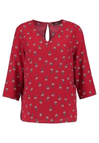 Blouse rouge à motif floral, encolure en V et manches trois-quarts. Texture douce avec un détail en forme de goutte d'eau dans le dos.