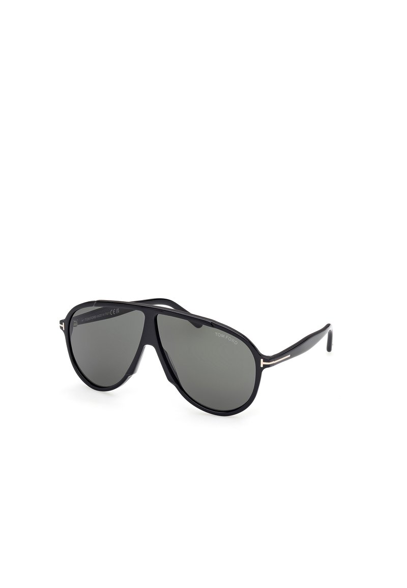 Aviator-style sunglasses with a glossy black plastic frame and gray tinted lenses, featuring gold-tone accents on the temples.