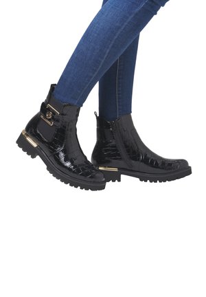 Remonte Bottines à plateau - lackschwarz