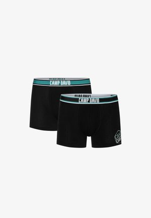 Boxer neri con elastico turchese riportante il testo "CAMP DAVID". Tessuto morbido con vestibilità strutturata, parte anteriore con tasca e dettaglio del logo.