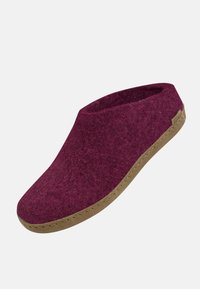 Burgundy felt slipper with a curved upper and a textured brown rubber sole. Features a seamless design and minimalistic aesthetic.