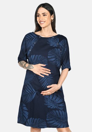 Navy blue dress with a leaf pattern, short sleeves, and snap button accents. Soft fabric, knee-length, suitable for maternity wear.