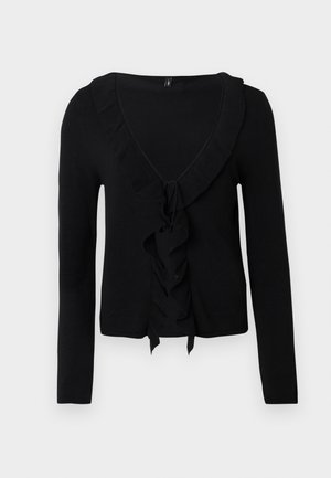 Melna garām piedurknēm kardigans ar dziļu V-veida izgriezumu, volānu apdari gar kakla līniju un priekšējo daļu, kā arī saites detaļu priekšējā vidus daļā.